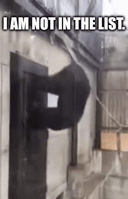 Chimpanzee trying to open a door with the caption "I am not on the list."