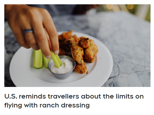 a hand dips celery into ranch dressing. chicken wings are also visible on the plate. the text reads U.S. reminds travellers about the limits on flying with ranch dressing.