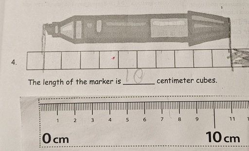 Measurement homework in which 10 centimeter cubes are >11cm long